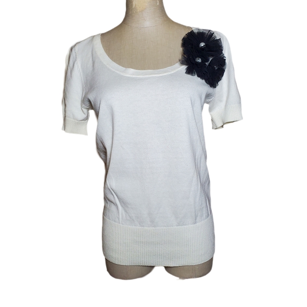 Elegant Cream Top with Black Floral Accent
